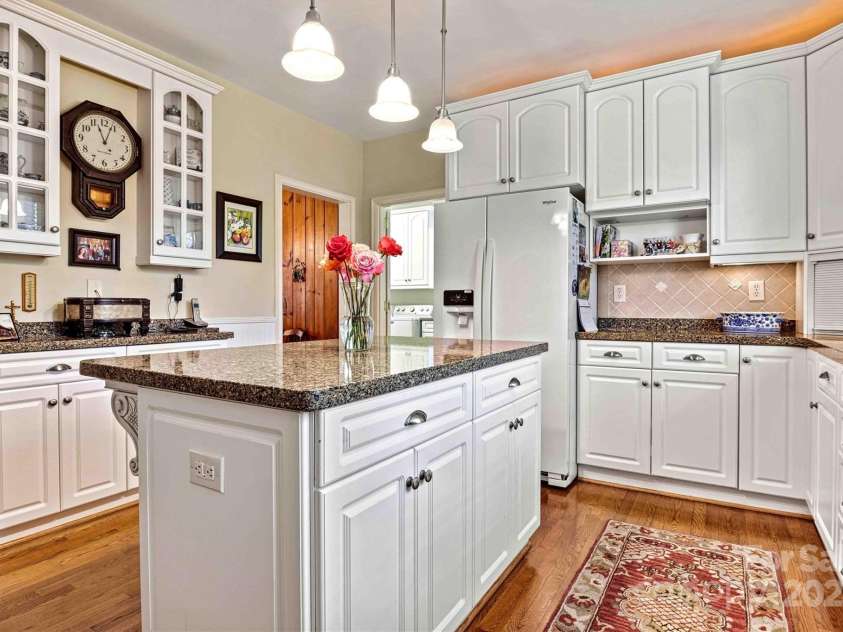 842 North Center Street, Hickory, NC 28601.  MLS# CAR4215232, YatesRealty ID 5087. Kitchen/Informal Dining and Laundry Room Entry View