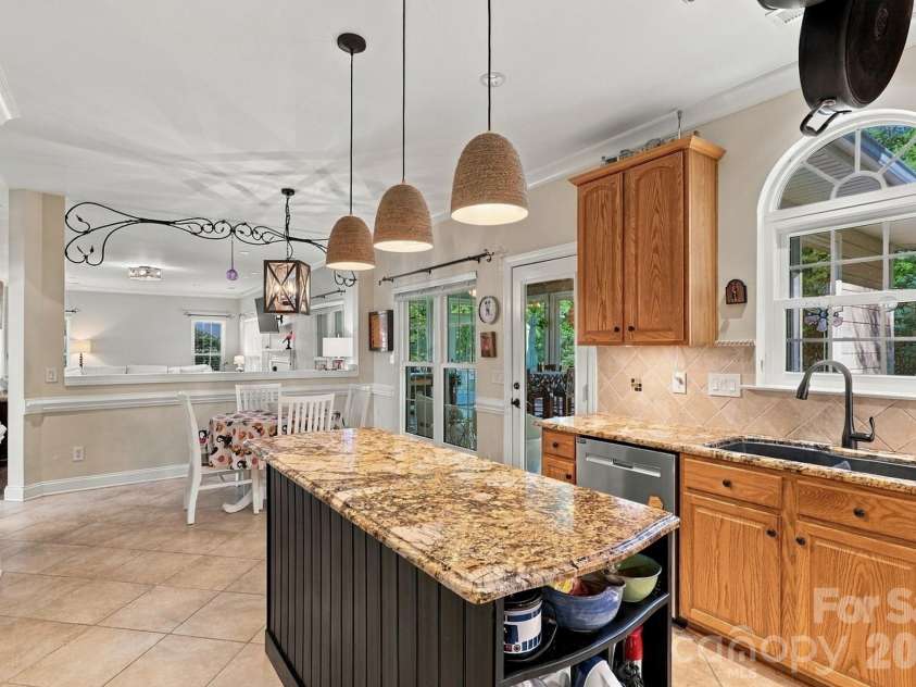 1213 Boyden Place, Concord, NC 28027.  MLS# CAR4419628, YatesRealty ID 50873. Kitchen open to living room