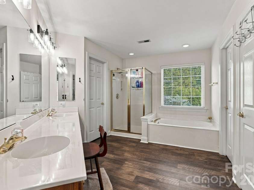 1213 Boyden Place, Concord, NC 28027.  MLS# CAR4419628, YatesRealty ID 50873. Primary bedroom ensuite with two closets