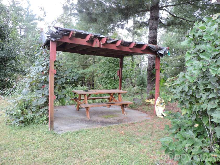 74 Vaughn Road, Spruce Pine, NC 28777.  MLS# CAR4424283, YatesRealty ID 50876. Picnic table for enjoying nice weather!