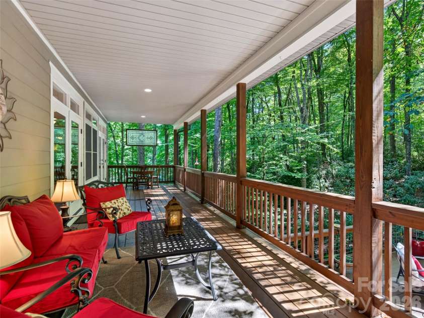 427 Locust Drive, Maggie Valley, NC 28751.  MLS# CAR4424585, YatesRealty ID 50881. Covered Back Porch