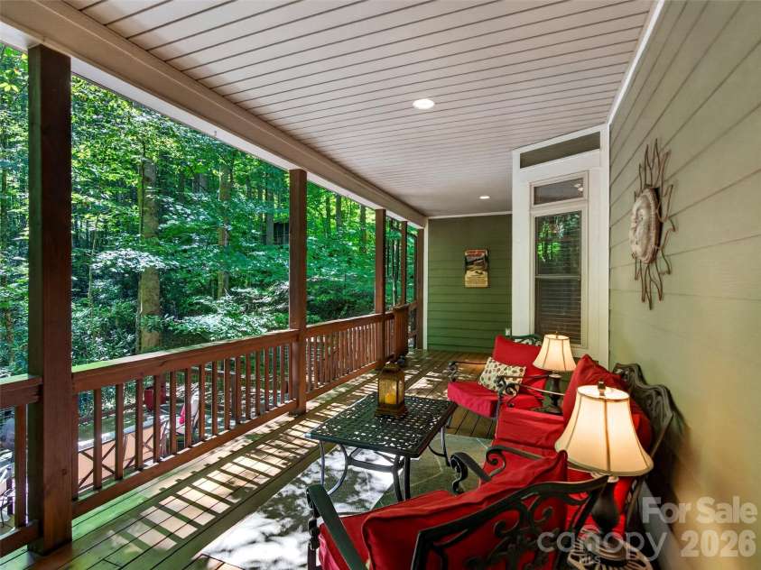 427 Locust Drive, Maggie Valley, NC 28751.  MLS# CAR4424585, YatesRealty ID 50881. Covered Back Porch
