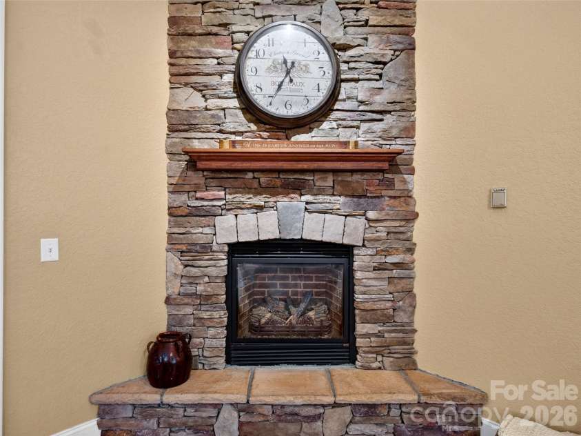 427 Locust Drive, Maggie Valley, NC 28751.  MLS# CAR4424585, YatesRealty ID 50881. Gas Fireplace