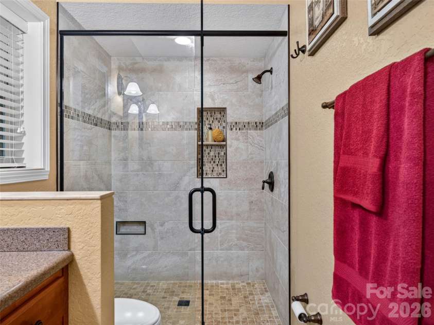 427 Locust Drive, Maggie Valley, NC 28751.  MLS# CAR4424585, YatesRealty ID 50881. Primary Bathroom