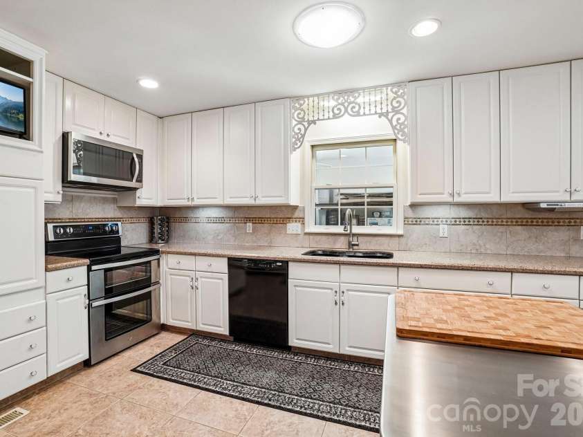 54 Gap Creek Road, Fletcher, NC 28732.  MLS# CAR4423914, YatesRealty ID 50895. 