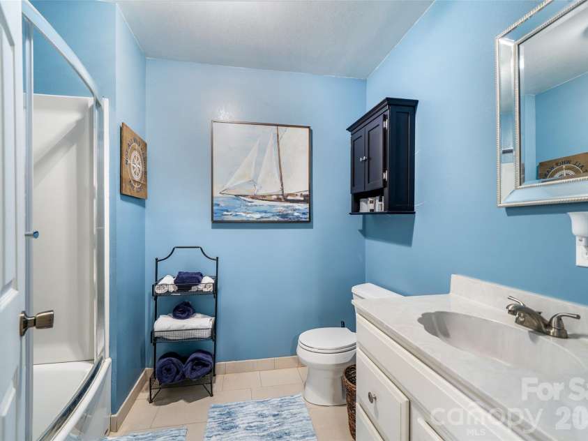18 Friendly Way, Asheville, NC 28806.  MLS# CAR4423504, YatesRealty ID 50897. 3rd full bath on lower floor