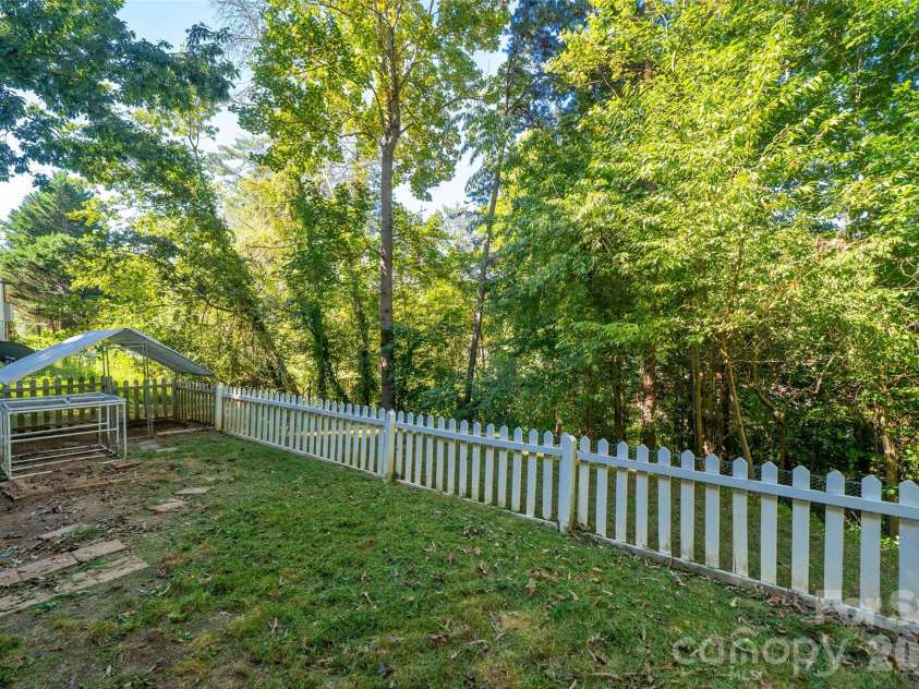 18 Friendly Way, Asheville, NC 28806.  MLS# CAR4423504, YatesRealty ID 50897. Fenced in backyard