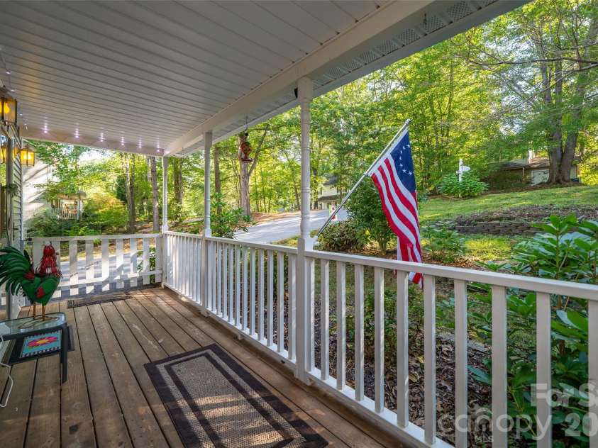 18 Friendly Way, Asheville, NC 28806.  MLS# CAR4423504, YatesRealty ID 50897. Front porch with doggy gate