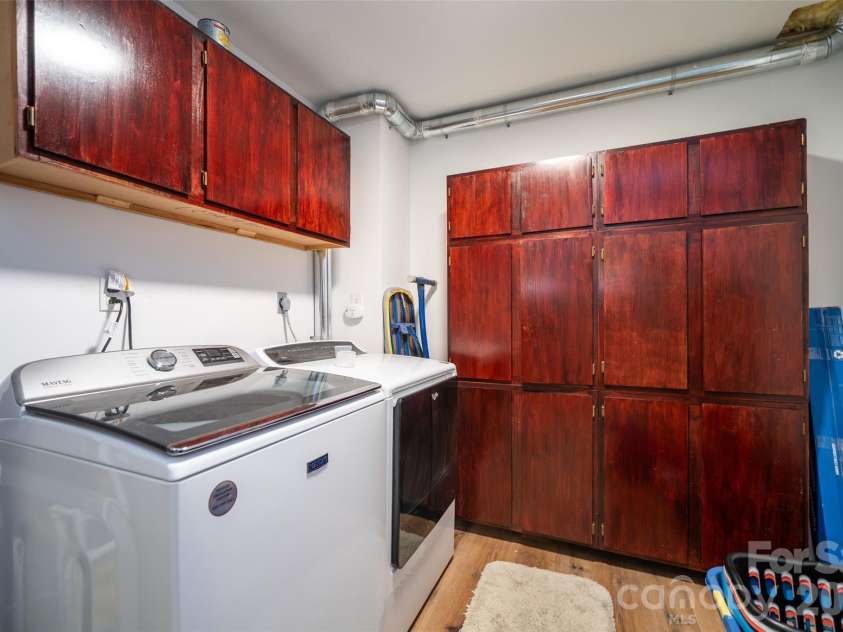 18 Friendly Way, Asheville, NC 28806.  MLS# CAR4423504, YatesRealty ID 50897. Laundry with lots of storage