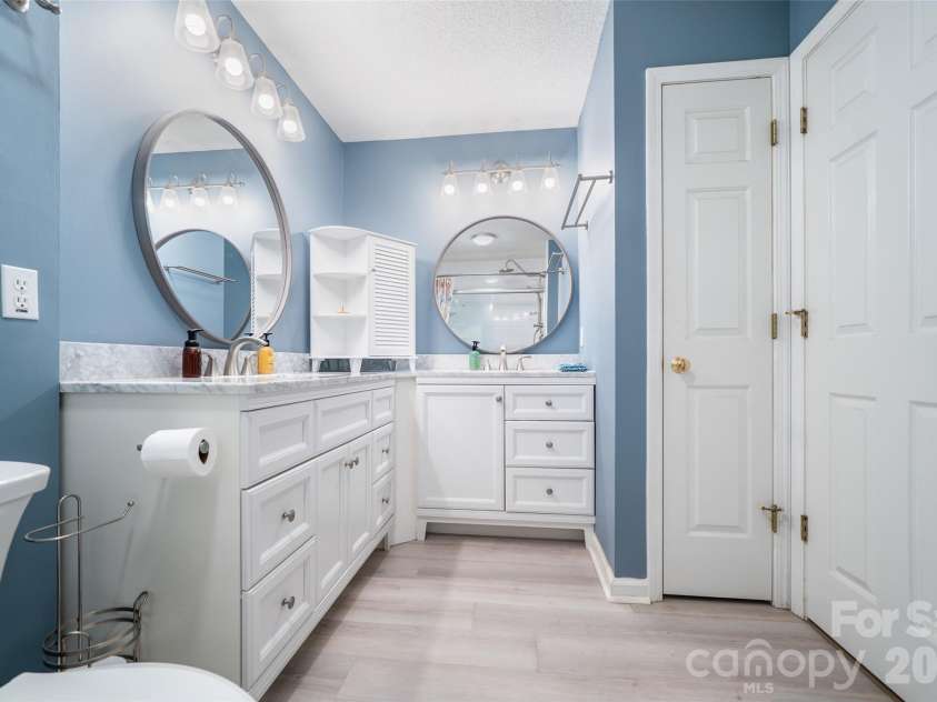 18 Friendly Way, Asheville, NC 28806.  MLS# CAR4423504, YatesRealty ID 50897. Primary bath with two sinks