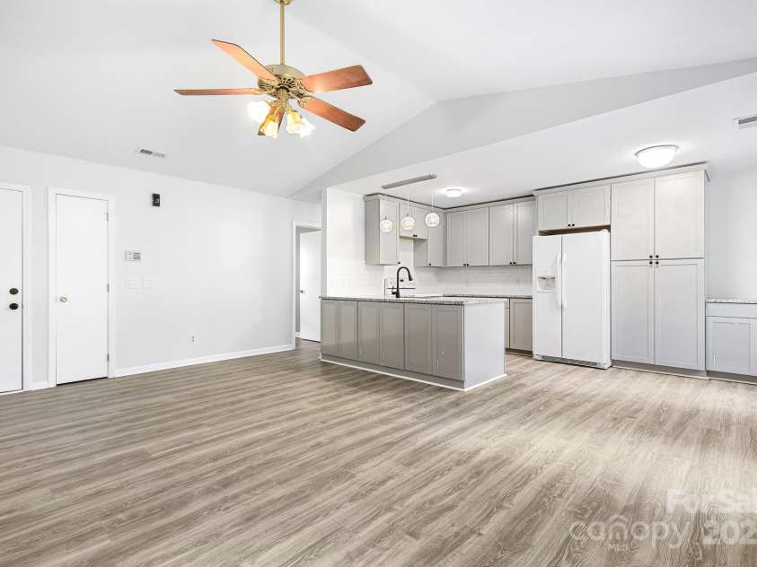 134 Mills Valley Drive, Mooresville, NC 28117.  MLS# CAR4301666, YatesRealty ID 509. Open space Living Room/Kitchen