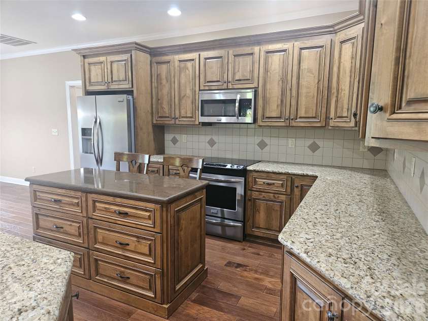 323 Wendover Drive, Locust, NC 28097.  MLS# CAR4424542, YatesRealty ID 50902. 