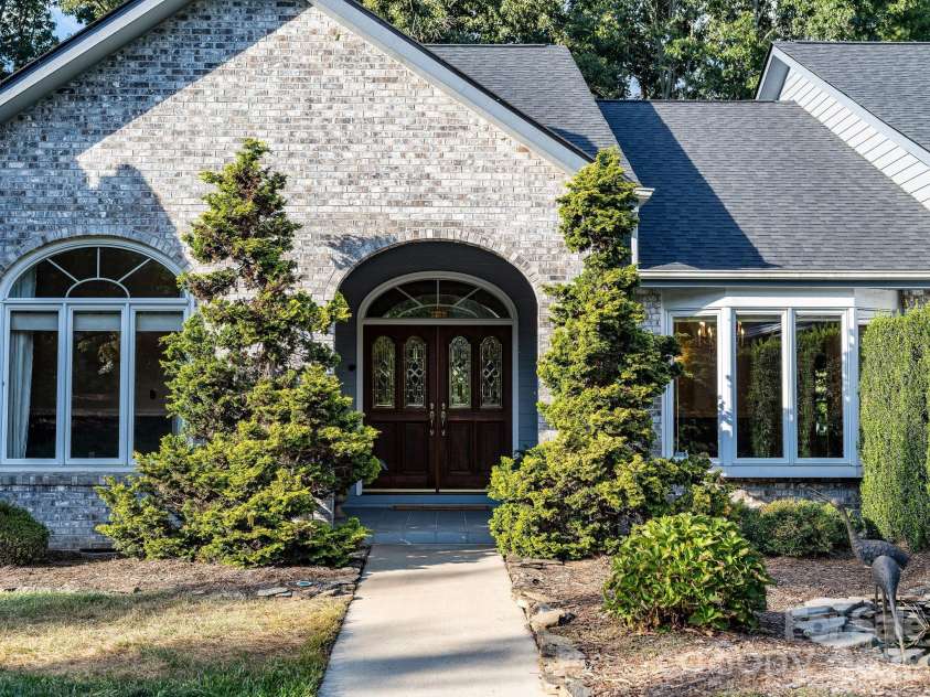13 Lowry Lane, Weaverville, NC 28787.  MLS# CAR4415194, YatesRealty ID 50910. Beautiful covered entry.