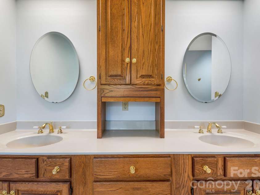 13 Lowry Lane, Weaverville, NC 28787.  MLS# CAR4415194, YatesRealty ID 50910. Primary bath double vanity.
