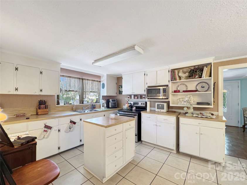 25 Stowe Street, Lowell, NC 28098.  MLS# CAR4424867, YatesRealty ID 50912. 