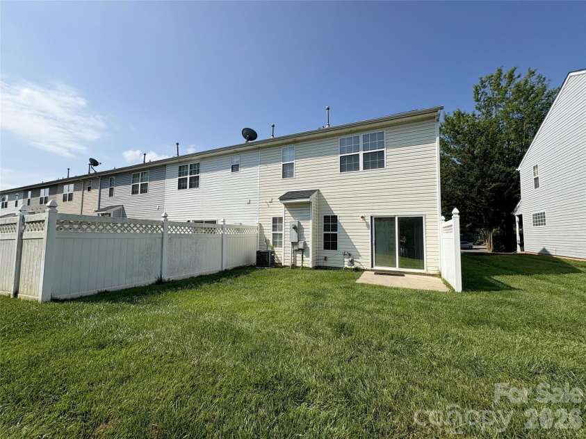 11637 Coddington Ridge Drive, Charlotte, NC 28214.  MLS# CAR4400659, YatesRealty ID 50913. Back door and patio