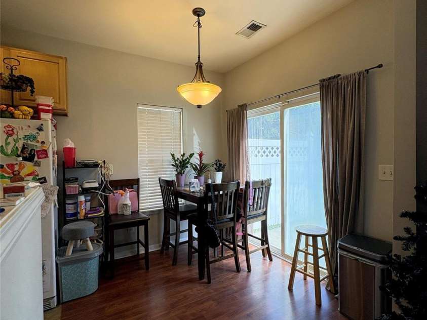 11637 Coddington Ridge Drive, Charlotte, NC 28214.  MLS# CAR4400659, YatesRealty ID 50913. Main level breakfast area