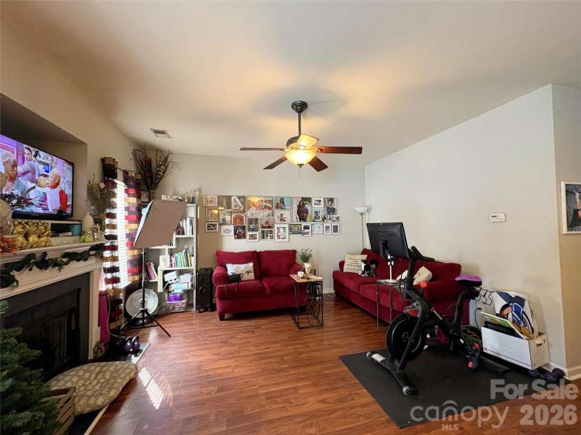 11637 Coddington Ridge Drive, Charlotte, NC 28214.  MLS# CAR4400659, YatesRealty ID 50913. Main level living room