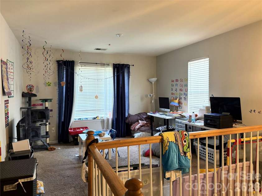 11637 Coddington Ridge Drive, Charlotte, NC 28214.  MLS# CAR4400659, YatesRealty ID 50913. Upper level loft
