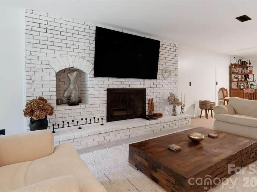 336 Sky Lake Drive, Hendersonville, NC 28739.  MLS# CAR4405648, YatesRealty ID 50927. Second Brick Fireplace