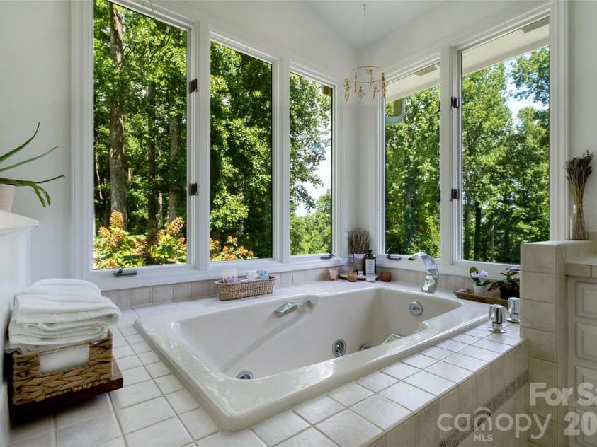 336 Sky Lake Drive, Hendersonville, NC 28739.  MLS# CAR4405648, YatesRealty ID 50927. Soaking Tub with a View