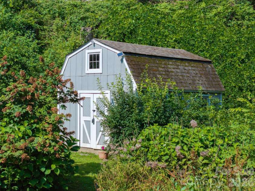 336 Sky Lake Drive, Hendersonville, NC 28739.  MLS# CAR4405648, YatesRealty ID 50927. Storage Shed