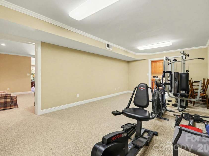 746 Grandview Drive, Concord, NC 28025.  MLS# CAR4434570, YatesRealty ID 5093. 290 sq ft flex room for a gym, hobbies or storage