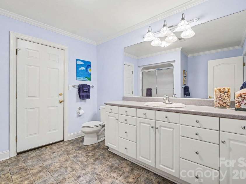 746 Grandview Drive, Concord, NC 28025.  MLS# CAR4434570, YatesRealty ID 5093. Full bath for the basement/2nd living quarters