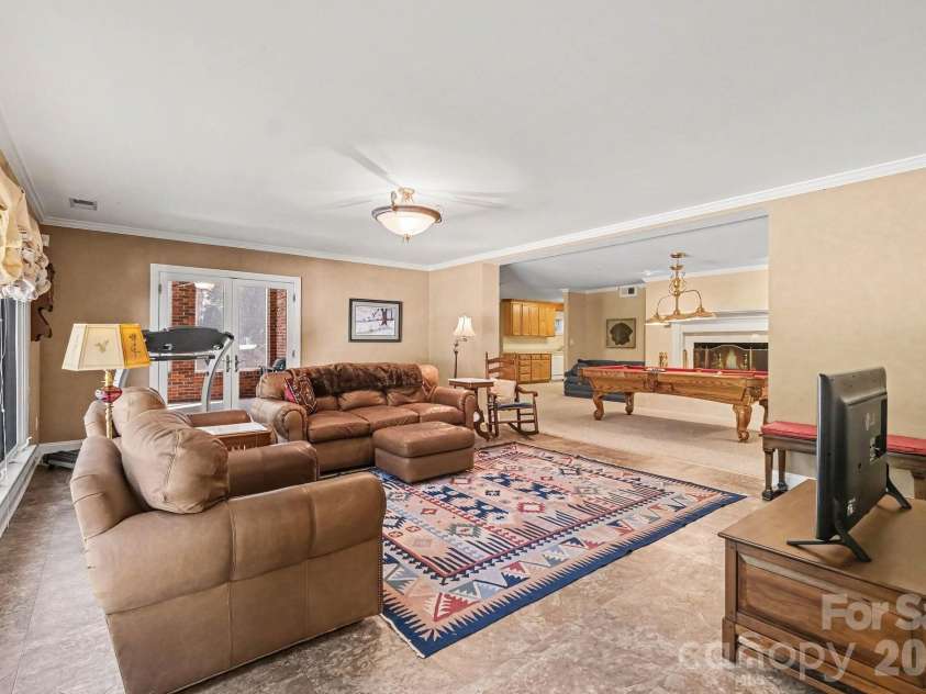 746 Grandview Drive, Concord, NC 28025.  MLS# CAR4434570, YatesRealty ID 5093. Fully finished walkout basement designed as a 2nd living quarters