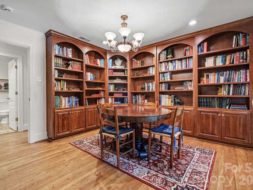 746 Grandview Drive, Concord, NC 28025.  MLS# CAR4434570, YatesRealty ID 5093. Versatile library with beautiful custom built-ins connects to the executive office - can also function as a nursery, playroom, collectibles showcase, or potential 5th bedroom (just add a wardrobe!)
