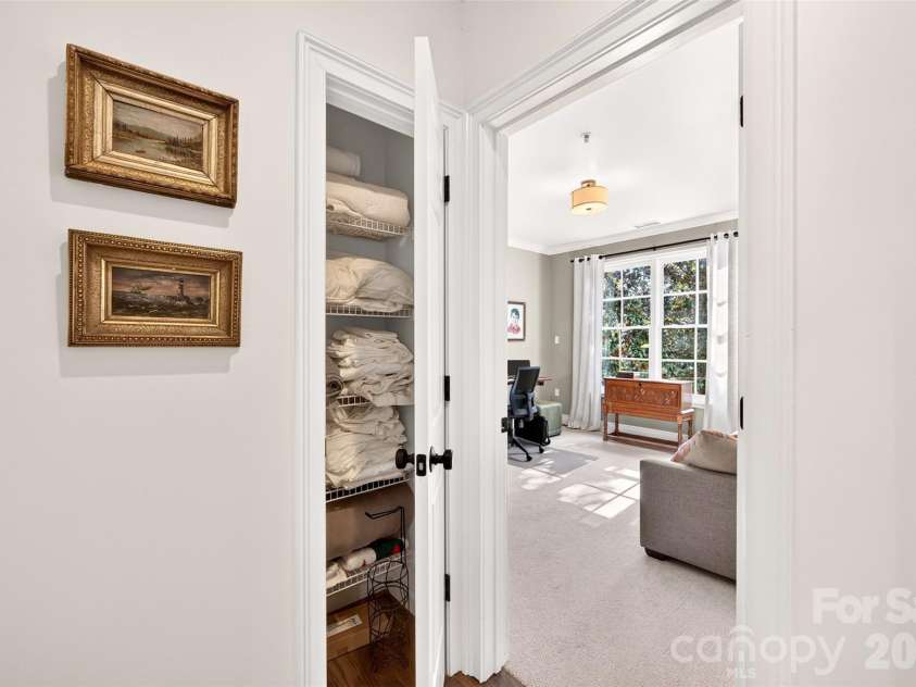 318 Wendover Heights Circle, Charlotte, NC 28211.  MLS# CAR4424763, YatesRealty ID 50941. Upstairs hall storage