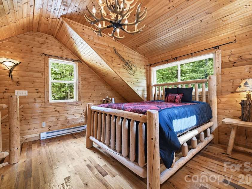 1158 Staghorn Road, Purlear, NC 28665.  MLS# CAR4424925, YatesRealty ID 50942. Loft Bedroom with Ensuite Bathroom