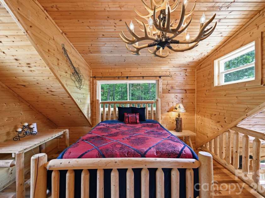 1158 Staghorn Road, Purlear, NC 28665.  MLS# CAR4424925, YatesRealty ID 50942. Loft Bedroom with Ensuite Bathroom