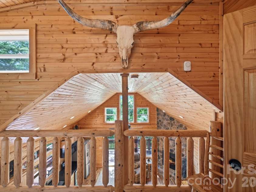 1158 Staghorn Road, Purlear, NC 28665.  MLS# CAR4424925, YatesRealty ID 50942. Loft Bedroom with Ensuite Bathroom