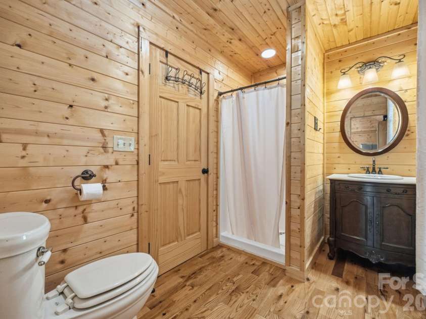 1158 Staghorn Road, Purlear, NC 28665.  MLS# CAR4424925, YatesRealty ID 50942. Main Level Ensuite Bathroom