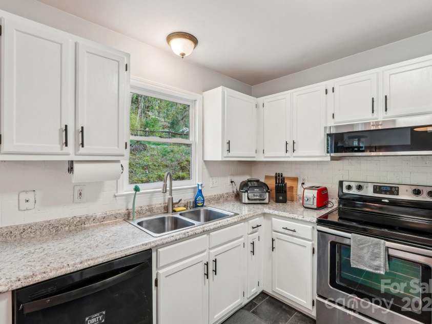 6005 Lanai Lane, Tega Cay, SC 29708.  MLS# CAR4243330, YatesRealty ID 5096. 