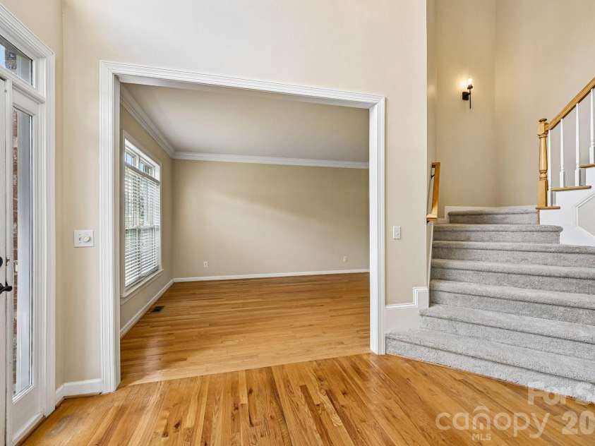 1930 Copperplate Road, Charlotte, NC 28262.  MLS# CAR4319139, YatesRealty ID 50966. Foyer to Den view