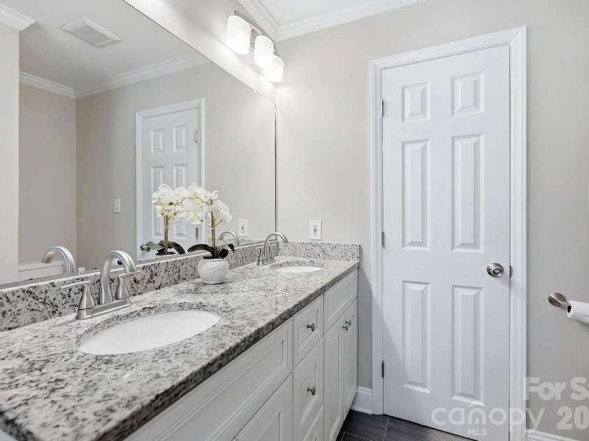 4400 Strangford Avenue, Charlotte, NC 28215.  MLS# CAR4422804, YatesRealty ID 50980. Dual vanity bathroom sinks upstairs level