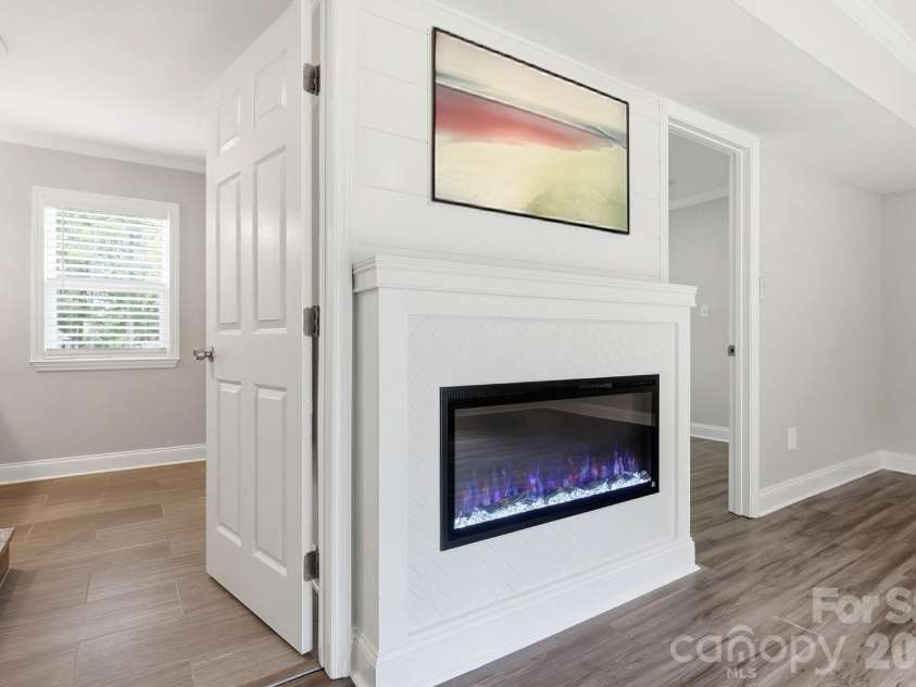 4400 Strangford Avenue, Charlotte, NC 28215.  MLS# CAR4422804, YatesRealty ID 50980. Lower level has a full bathroom and laundry area