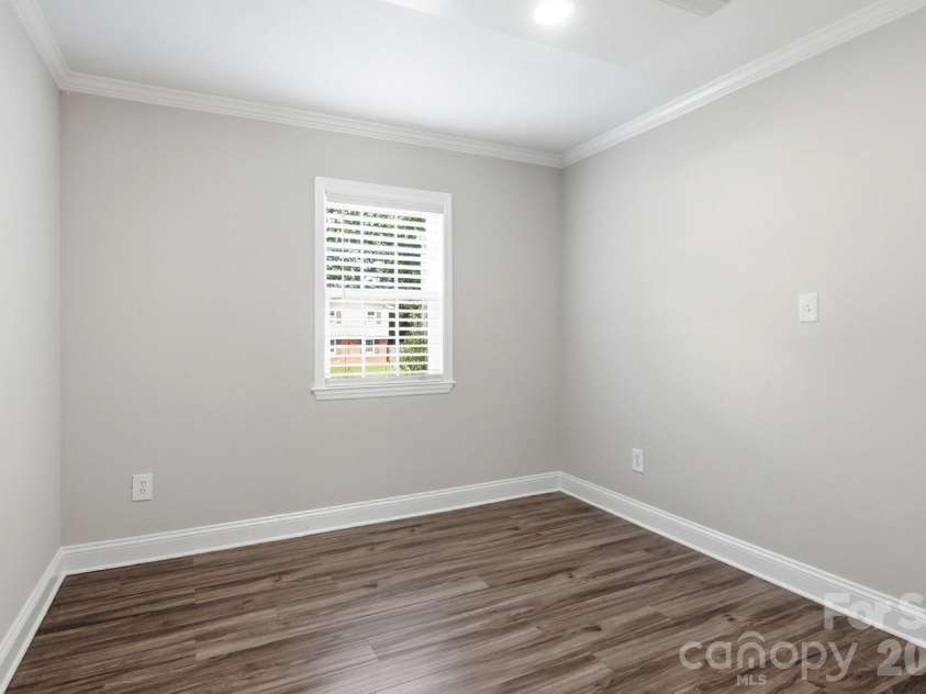 4400 Strangford Avenue, Charlotte, NC 28215.  MLS# CAR4422804, YatesRealty ID 50980. Lower level offers the 4th bedroom or office space
