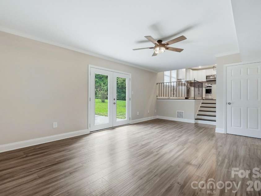 4400 Strangford Avenue, Charlotte, NC 28215.  MLS# CAR4422804, YatesRealty ID 50980. Lower level opens to a large private rear fully fenced yard