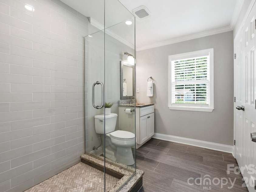 4400 Strangford Avenue, Charlotte, NC 28215.  MLS# CAR4422804, YatesRealty ID 50980. Lower level updated full bathroom