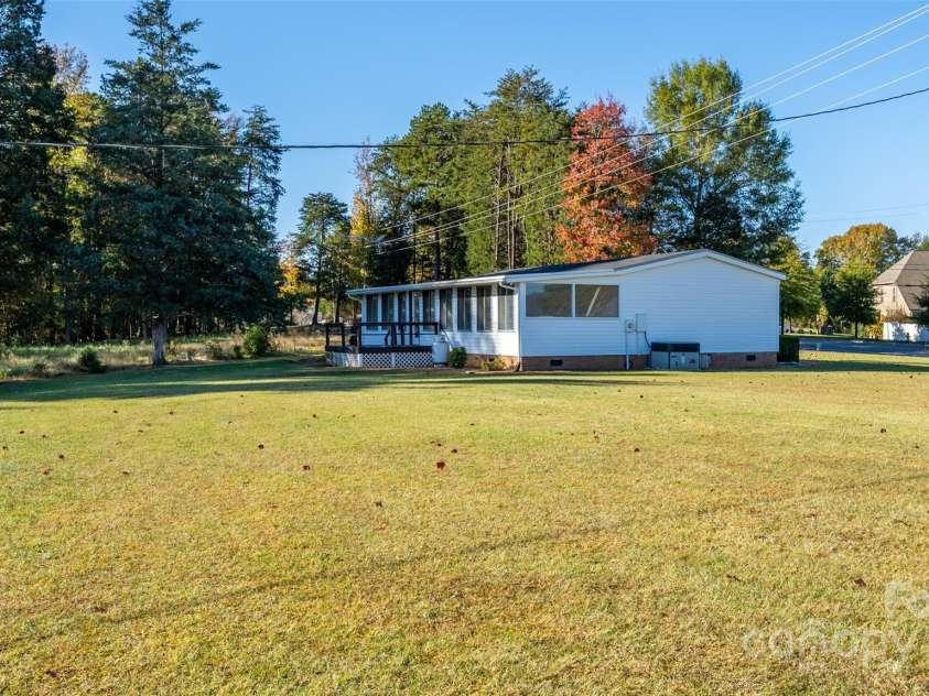 110 Jenkins Farm Lane, Mooresville, NC 28115.  MLS# CAR4316175, YatesRealty ID 510. Side View Modular w/Shed