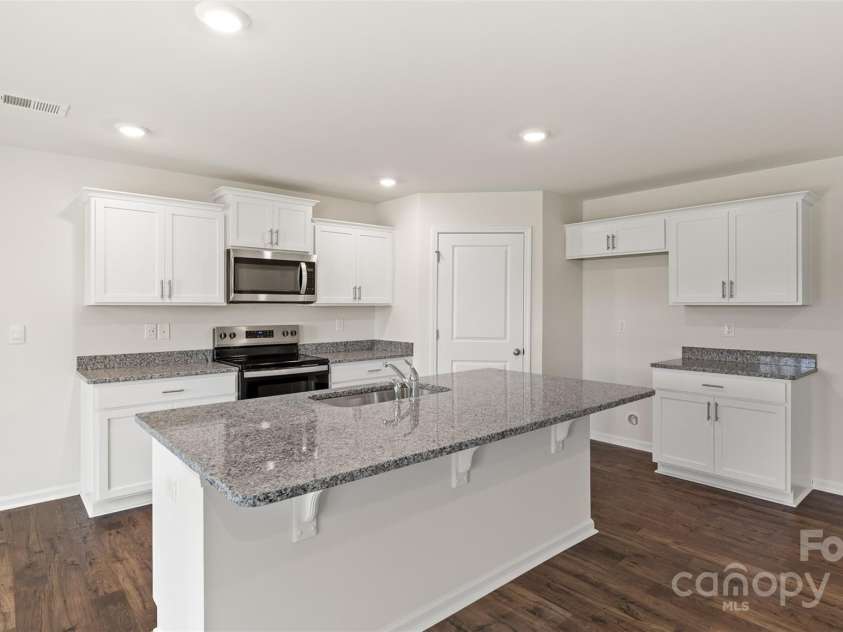 27 Wildbrook Drive, Waynesville, NC 28785.  MLS# CAR4245462, YatesRealty ID 5102. Photos are representative