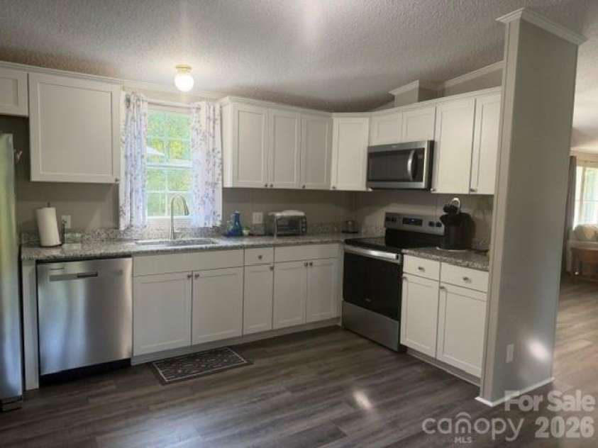 321 Onvil Road, Mount Gilead, NC 27306.  MLS# CAR4425219, YatesRealty ID 51029. Kitchen