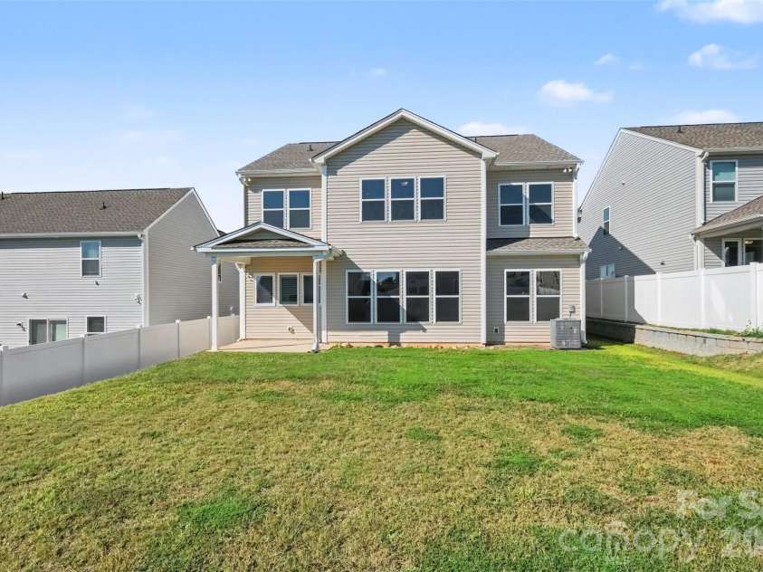 6343 Clarisse Drive, Concord, NC 28025.  MLS# CAR4434568, YatesRealty ID 5104. Backyard