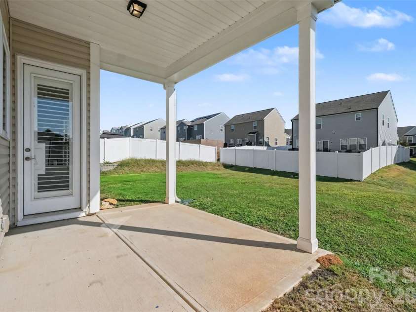 6343 Clarisse Drive, Concord, NC 28025.  MLS# CAR4434568, YatesRealty ID 5104. Covered back patio