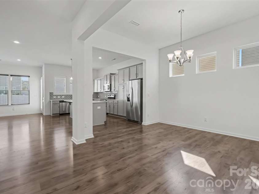 6343 Clarisse Drive, Concord, NC 28025.  MLS# CAR4434568, YatesRealty ID 5104. Dining Room into Kitchen