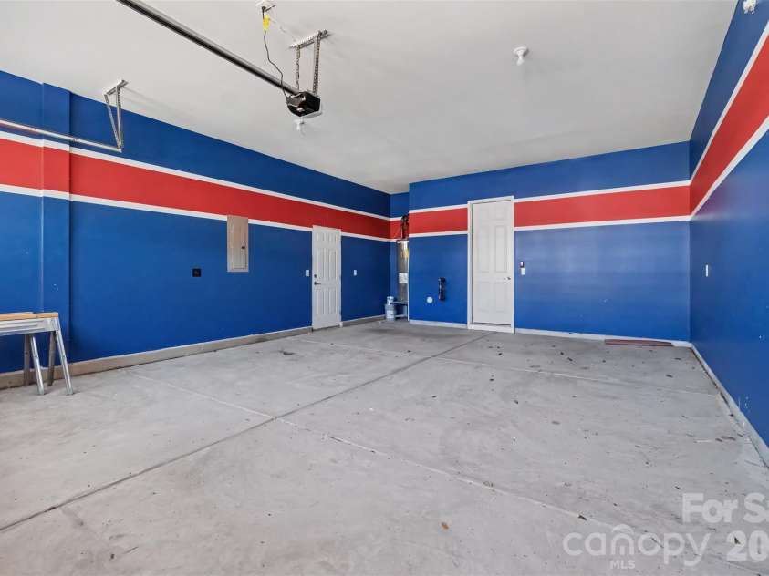 6343 Clarisse Drive, Concord, NC 28025.  MLS# CAR4434568, YatesRealty ID 5104. Garage with EV Charger