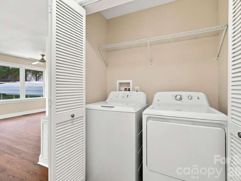 117 Ho Hum Way, Leicester, NC 28748.  MLS# CAR4422890, YatesRealty ID 51054. Hallway Laundry